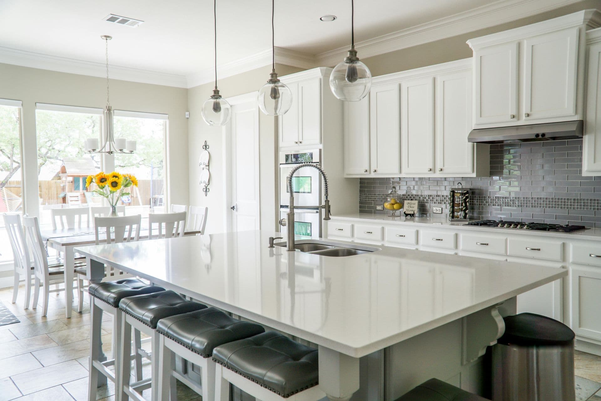 Bright modern kitchen with white cabinets